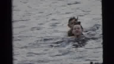 Camden New Jersey (1961): Kids Are Playing In Open Water Teasing Each Other With