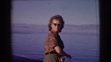 Clarkdale Arizona (1961): Woman Looks Away From Water Over Car Towards Camera And