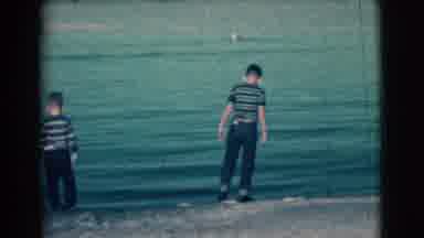 Clarkdale Arizona (1961): Two Young Boys Wearing Striped Shirts And Blue Jeans