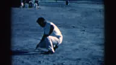 Clarkdale Arizona (1961): Squatting Man In Shirt Pants And Shoes Using Stick To