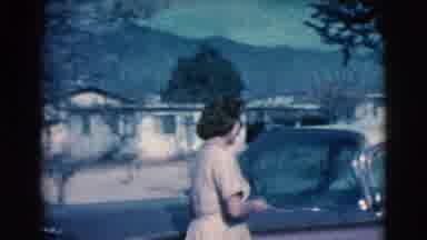Clarkdale Arizona (1961): Car Travel Woman Neighborhood Casual Automobile Houses