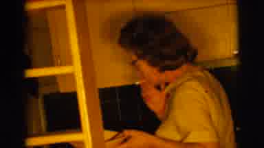 Clarkdale Arizona (1961): A Lady Taking A Puff Of A Cigarette In Her Home As She