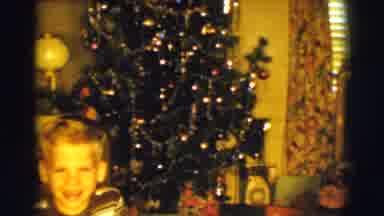 Clarkdale Arizona (1961): A Boy Is Standing In Front Of Christmas Tree In Home For