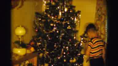 Clarkdale Arizona (1961): Boys Are Next To A Christmas Tree And One Reaches For A