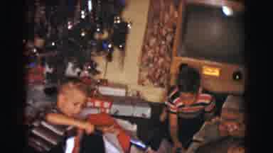 Clarkdale Arizona (1961): Two Boys Tearing Open Christmas Presents