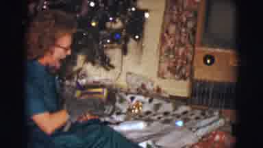 Clarkdale Arizona (1961): One Lady Sitting Inside Of The House And Open A Gift And