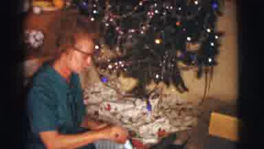 Clarkdale Arizona (1961): Woman Sitting On The Floor Next To A Christmas Tree