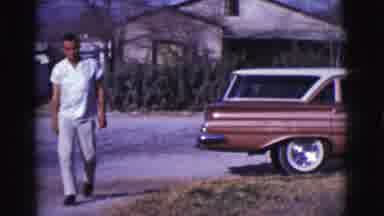 Clarkdale Arizona (1961): Man Holding Cigarette Walks Outside From Rear Of Copper