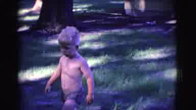 Clarkdale Arizona (1961): A Child Is Playing In The Garden With His Mother