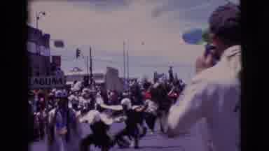 Clarkdale Arizona-1961: Native American Dancers Marching With 'Laguna' Sign