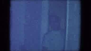 Salton Sea California (1961): Man Wearing White Shirt Waves Arm While Walking