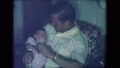 Salton Sea California (1961): Your Father Sitting Holding His Newborn Baby Girl