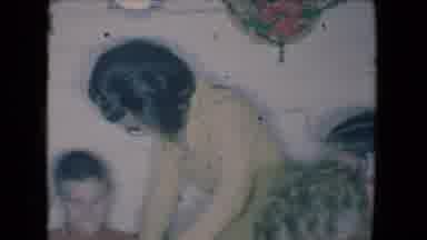 Salton Sea California (1961): A Lady Is Standing Over A Table Outside Cutting Up