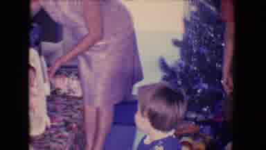 Salton Sea California (1961): A Baby Is Surrounded By A Few People With A