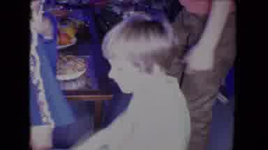 Salton Sea California (1961): A Young Boy Seems Happy In A House With Many Other