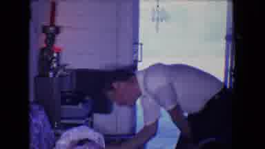 Salton Sea California (1961): Dad Comforting His Crying Newborn Baby Laying In Her