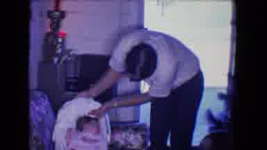 Salton Sea California (1961): Young Father Taking Care Of Crying Baby And