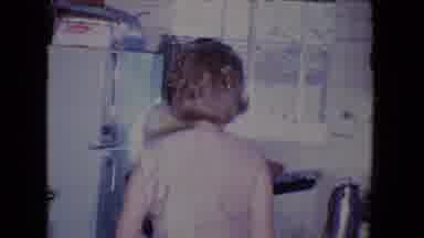Salton Sea California (1961): Husband Prepares Meal For Thanksgiving Feast With