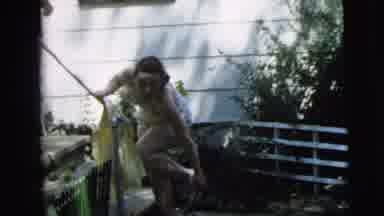 Camden New Jersey (1962): Girls One Of Them Cleaning Her Foot Near There Is A