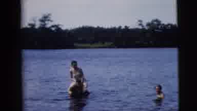 Camden New Jersey (1962): Woman Sitting On The Shoulders Of A Man While In A Lake