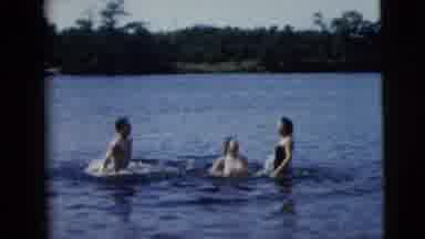 Camden New Jersey (1962): Summer Three People Playing Jumping And Having Fun In A