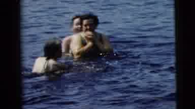 Camden New Jersey (1962): Four People Swim And Play In An Open Body Of Water