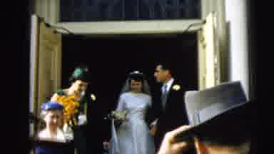 Camden New Jersey (1962): A Bride And Groom Proceed Arm In Arm Out Of The Church