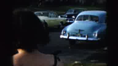 Camden New Jersey (1962): Man And Woman Stand Outside Talking To Someone On The