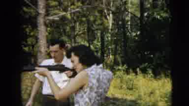 Camden New Jersey (1962): Couple Shooting With Rifle On Forest