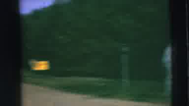 Camden New Jersey (1962): Woman Wearing White Shirt Walks Away From Camera On A