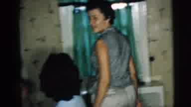 Camden New Jersey (1962): Man And Woman Enter The Room And Man Waves At The Others