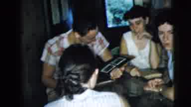 Camden New Jersey (1962): Women Gathered Talking About Something While A Child