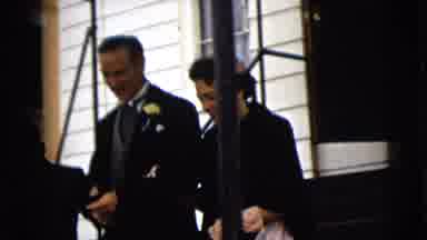 Camden New Jersey (1962): Happy Older Couple Leaving A White Cladded Building In