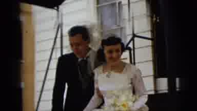 Camden New Jersey (1962): Newlywed Couple Walks Downstairs Towards Black Car On A
