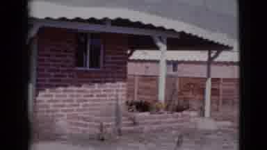 Cottonwood Arizona (1964): Red Brick House With Corrugated Roof