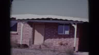 Cottonwood Arizona (1964): Panning Shot Of Old Brick House With A Tin Roof