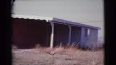 Cottonwood Arizona (1964): Red Brick And Blue House On A Bright Sunny Day
