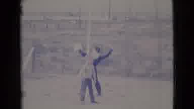 Cottonwood Arizona (1964): Two Boys Play With A Ball In A Field One Is Dressed As