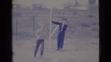 Cottonwood Arizona (1964): One Boy Grabs A Ball And Throws It To A Second Boy In A