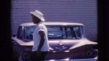 Cottonwood Arizona (1964): Man With Cowboy Hat Walking Toward Car Asking Someone