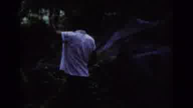 Cottonwood Arizona (1964): A Man Stretching And A Man Getting Inside A Car