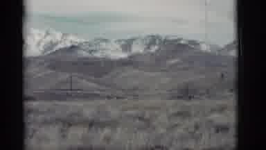 New Mexico (1964): Amazing Green Rolling Hills In Front Of Huge Snow Covered