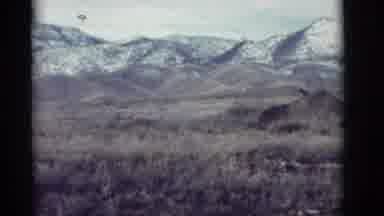 New Mexico (1964): Beautiful Landscape Of A Green Field Mountain And A Lot Of