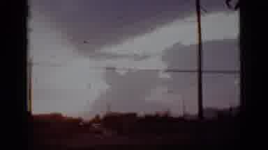 Tuscon Arizona-1965: Stormy Sky Over State Highway With Power Lines And Lone Car