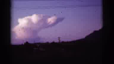 Tuscon Arizona-1965: A Large Unusually Shaped Cloud Sits In The Background Of A