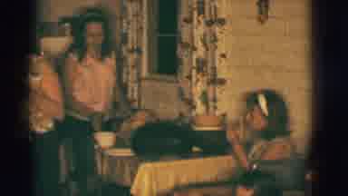 Clarkdale Arizona (1966): Men And Kids Sit Around The House Talking While Ladies