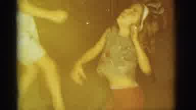 Clarkdale Arizona (1966): Woman And Child Dancing The Twist While Boy In Striped