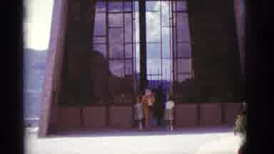 Clarkdale Arizona (1966): A Very Tall Building With People Coming Out Of The Doors
