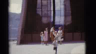 Clarkdale Arizona (1966): A Group Of People Standing Outside In Front Of A Very