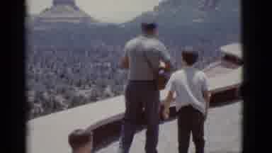 Clarkdale Arizona (1966): A Man And His Son Walk Across An Overlook To A Mountain